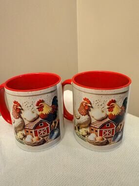 Two 10 OZ charming farm scene ceramic mugs with roosters and chickens. NWOT